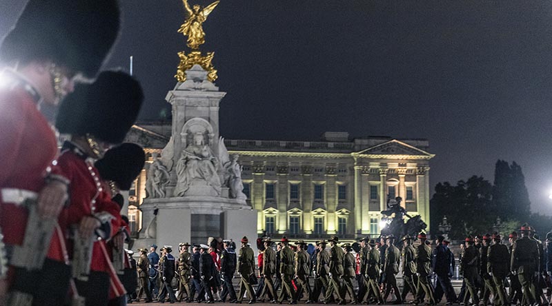 The commonwealth contingent passes Buckingham Palace during an early morning rehearsal for the Queen's funeral procession. Photo supplied by New Zealand Defence Force.