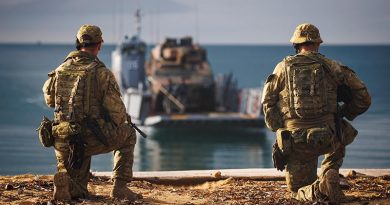 Australian Army soldiers from 10 Force Support Battalion await the arrival of a Boxer Combat Reconnaissance Vehicle during Exercise Sea Raider 2022 at Cowley Beach, Queensland. Photo by Corporal Cameron Pegg.