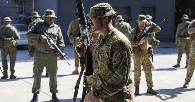 Australian Corporal Louis Carbery, an infantry soldier with 8/9RAR, discusses how his army clears hallways and intersections at Blackrock Training Camp, Fiji, during Exercise Cartwheel. Story and photo by US Army Sergeant Brian D. Jones, 343rd Mobile Public Affairs Detachment. 