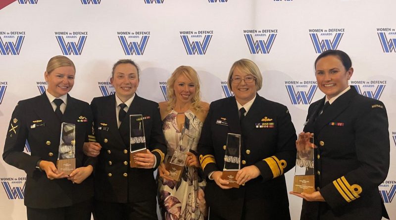 Petty Officer Sara Clarke, Lieutenant Commander Victoria Jnitova, Lieutenant Commander Cerys Joyce, Rear Admiral Wendy Malcolm and Commander Penelope Twemlow with their Women in Defence Awards. Story by Sub Lieutenant Tahlia Merigan.