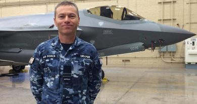 Wing Commander (then Squadron Leader) Nathan Draper stands in front of a United States Air Force F-35A aircraft at Luke Air Force Base, US, in 2016. Story by Evana Ho. Photo by Leigh Watson.