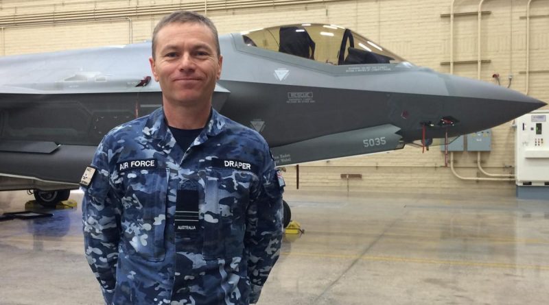 Wing Commander (then Squadron Leader) Nathan Draper stands in front of a United States Air Force F-35A aircraft at Luke Air Force Base, US, in 2016. Story by Evana Ho. Photo by Leigh Watson.