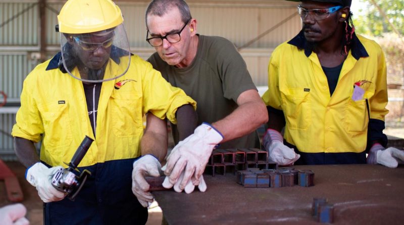Sapper Malcolm Stewart, from 6th Engineer Support Regiment, delivers trade training to trainees Jonathon Guyula and Alistair Mununggurr during the Army Aboriginal Community Assistance Program in Gapuwiyak. Story by Captain Evita Ryan. Photo by Corporal Lucas Petersen.