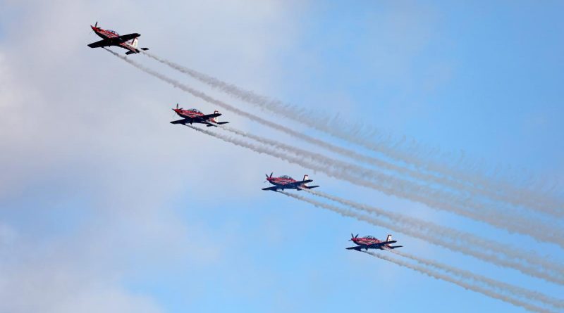 The Air Force Roulettes perform an aerobatic display over the air traffic control tower for the Air Force Roulette's 50th anniversary family open day at RAAF Base East Sale, Victoria. Story by Flying Officer Brent Moloney. Photos by Richard Prideaux.