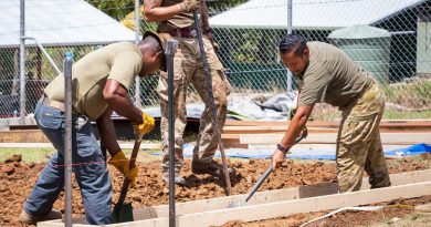 Australian Army Sapper Ingrid Reitermeier, right, works alongside Papua New Guinea Defence Force and British Army soldiers on site during Exercise Puk Puk at Goldie River Training Depot in Papua New Guinea. Story by Major Jesse Robilliard. Photo by Sergeant Nunu Campos.