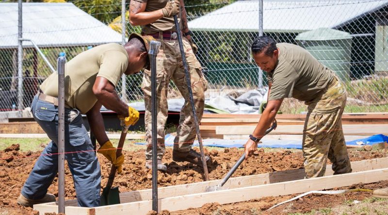 Australian Army Sapper Ingrid Reitermeier, right, works alongside Papua New Guinea Defence Force and British Army soldiers on site during Exercise Puk Puk at Goldie River Training Depot in Papua New Guinea. Story by Major Jesse Robilliard. Photo by Sergeant Nunu Campos.