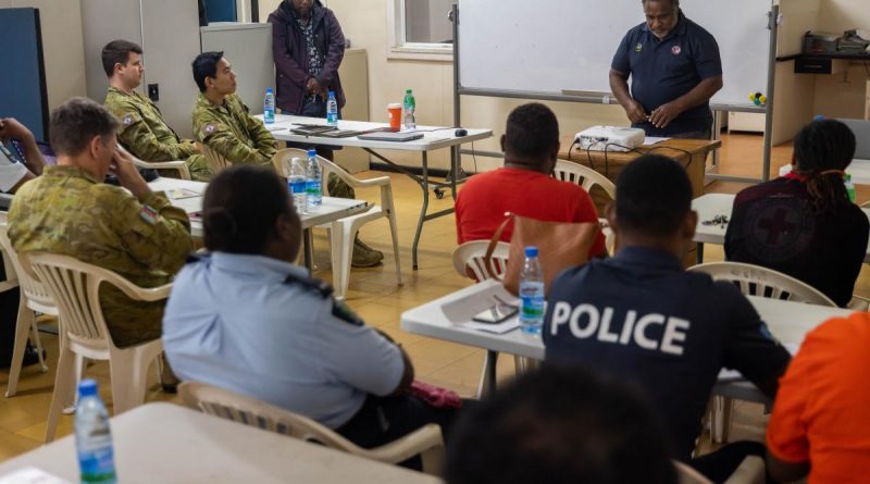 ADF members meet with members of the Solomon Islands Government to discuss humanitarian assistance and disaster relief in Honiara, Solomon Islands. Story by Lieutenant Geoff Long. Photo by Corporal Jonathan Goedhart.