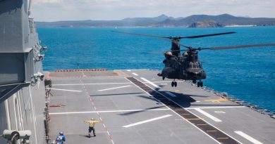 A Republic of Singapore Air Force CH-47F helicopter lands on the flight deck of HMAS Adelaide during Exercise Trident near Shoalwater Bay training area, Queensland. Story by Captain Carla Armenti. Photo by Corporal Cameron Pegg.