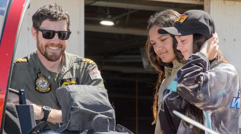 Lieutenant Jared Burton provides an overview of the Pilatus PC-21 aircraft to students, Skye Councillor and Jorja Hammond from Derby District High School. Story by Peta Magorian. Photo by Sergeant Gary Dixon.