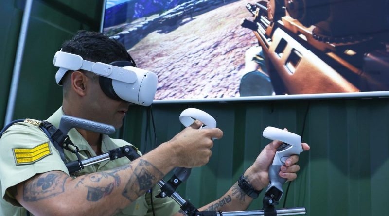 Sergeant Nitin Biswas operates virtual reality equipment at the 2022 Land Forces expo. Story and photo by Warrant Officer Class Two Max Bree.