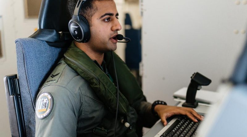 Royal Australian Air Force Corporal Mathan Sundaramoorthy works at his station on board a P-8A Poseidon aircraft during a maritime security mission while deployed on Operation Sea Guardian in Sicily. Story by Lieutenant Anthony Martin. Photo by Corporal John Solomon.