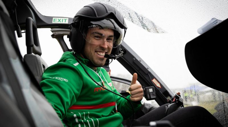 Tickford Racing driver Thomas Randle in the front seat of an EC-135 helicopter at Mount Panorama during the Bathurst 1000. Story by Sub Lieutenant Jess Gould. Photo by Leading Seaman David Cox.