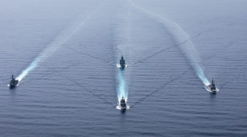 HMA Ships Hobart and Stalwart, Japan Maritime Self-Defense Force Ship Kirisame and US Navy Ship Milius in the South China Sea. Story by Lieutenant Brendan Trembath. Photo by Leading Seaman Daniel Goodman.
