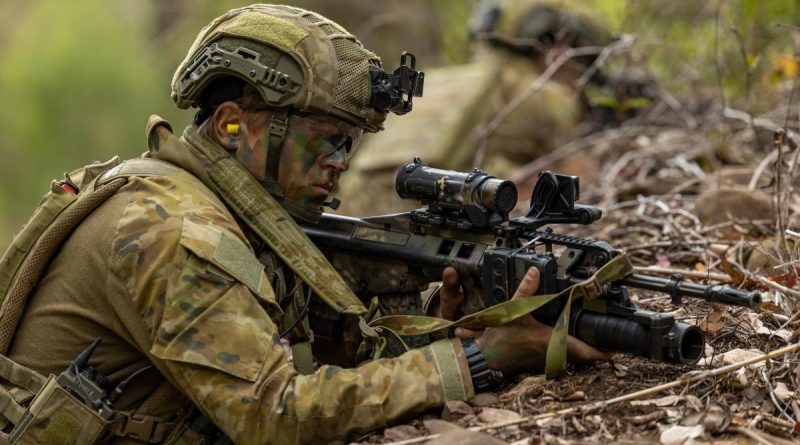 Private Mason Howell, of the 6th Battalion, Royal Australian Regiment, on patrol during live-fire training at Kokoda Barracks, Canungra. Story by Captain Cody Tsaousis. Photo by Signals Christopher Kingston.