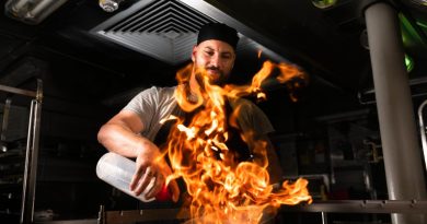 Maritime Logistics Chef Able Seaman Daniel Crowther prepares food in the galley on board HMAS Hobart during a regional presence deployment. Story by Lieutenant Brendan Trembath. Photo by Leading Seaman Daniel Goodman.