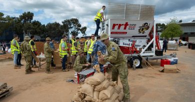 Australian Defence Force personnel assist Shepparton residents affected by the floods in the Victoria region. Photo by Private Tyson Grant.