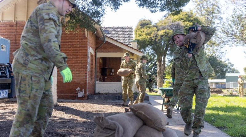 Army reservists from the greater Victorian region begin clearing flood damage items from the Rochester RSL in Victoria as part of the ADF’s ongoing support during Operation Flood Assist 2022-2. Story by Lieutenant Carolyn Martin. Photo by Corporal Jonathan Goedhart.