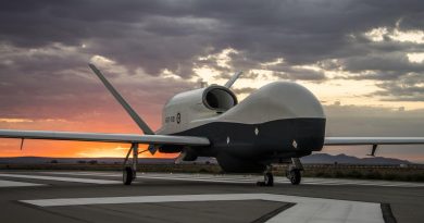 Australia's first MQ-4C Triton aircraft poses for its first official portraits after emerging from the Northrop Grumman Palmdale paint booth. Photo by Alan Radecki, Northrop Grumman Aeronautics Media Services.