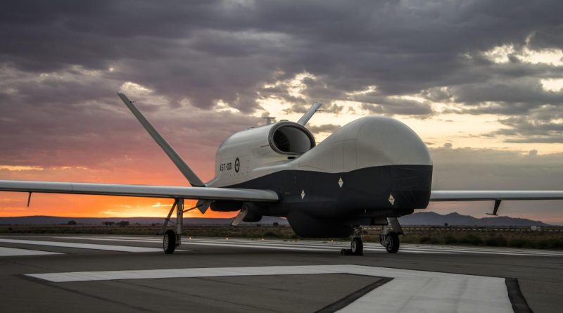 Australia's first MQ-4C Triton aircraft poses for its first official portraits after emerging from the Northrop Grumman Palmdale paint booth. Photo by Alan Radecki, Northrop Grumman Aeronautics Media Services.