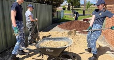Australian Defence Force Academy trainee officers help garden and clean the backyard of a Canberra community member for the Canberra Youth Residential Service. Story by Alex Donato. Photo by Flight Lieutenant Nicole Beames.