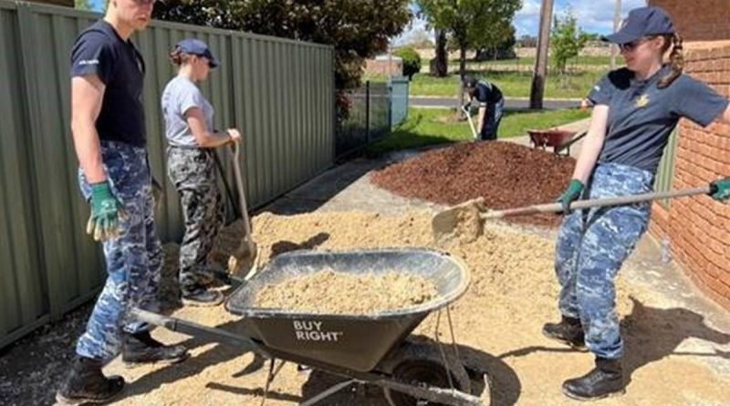 Australian Defence Force Academy trainee officers help garden and clean the backyard of a Canberra community member for the Canberra Youth Residential Service. Story by Alex Donato. Photo by Flight Lieutenant Nicole Beames.