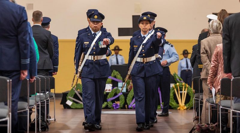Catafalque party members from No. 1 Remote Sensor Unit march from their post at the conclusion of the Battle of Britain commemoration ceremony at Torrens Parade Hall, Adelaide. Story by Flight Lieutenant Claire Burnet. Photo by Leading Aircraftman Sam Price.