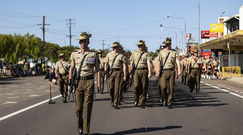 oldiers from the 3rd Battalion, Royal Australian Regiment, march through the town during the Freedom of Entry Parade in Ingham, Queensland. Story by Captain Diana Jennings. Photo by Bombardier Guy Sadler.