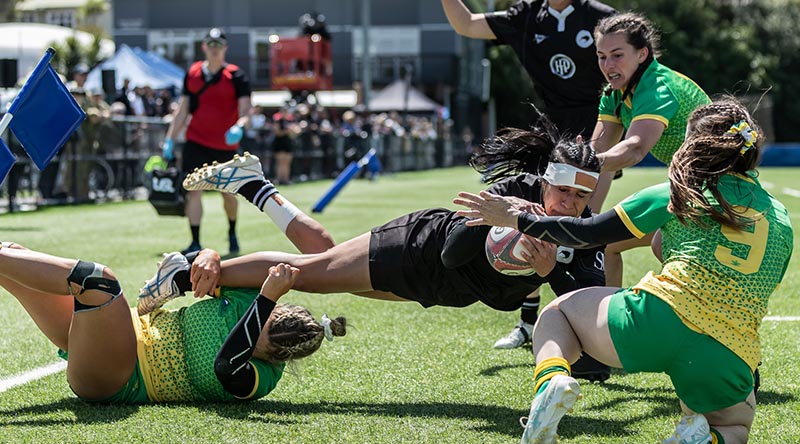 Action from the first ever women's International Defence Rugby Competition, a 15-a-side rugby tournament hosted by New Zealand. NZDF photo.