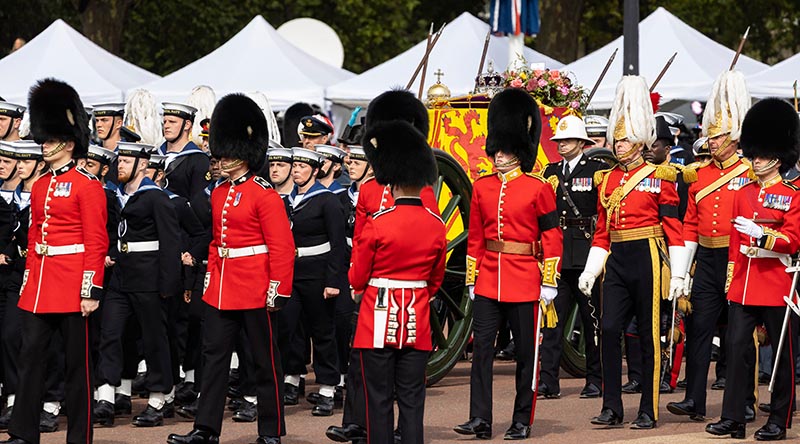 The State Gun Carriage, pulled by the British Royal Navy, carrying the coffin of Her Majesty Queen Elizabeth II as it moves along the procession route in London, during the state funeral of The Queen. Photo by Sergeant Jarrod McAneney.