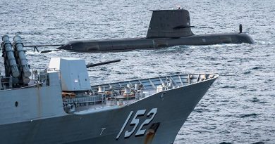 Royal Australian Navy submarine HMAS Waller sails in company with HMAS Warramunga during the inaugural Australian Submarine Command Course off Australia's east coast. Photo by Able Seaman Jarryd Capper.