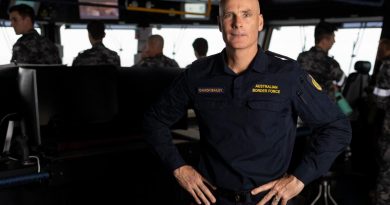 Australian Border Force Inspector Damon Bailey on the bridge of HMAS Adelaide during Indo-Pacific Endeavour 2022. Story by Flying Officer Brent Moloney. Photo by Leading Seaman Sittichai Sakonpoonpol.