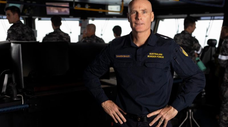 Australian Border Force Inspector Damon Bailey on the bridge of HMAS Adelaide during Indo-Pacific Endeavour 2022. Story by Flying Officer Brent Moloney. Photo by Leading Seaman Sittichai Sakonpoonpol.