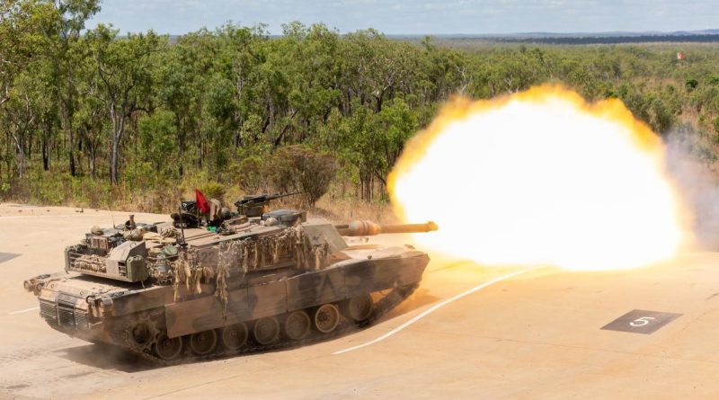 An M1A2 Abrams tank fires its main armament at the Mount Bundey training area in the Northern Territory during Exercise Predators Run. Story by Captain Mike Edwards.