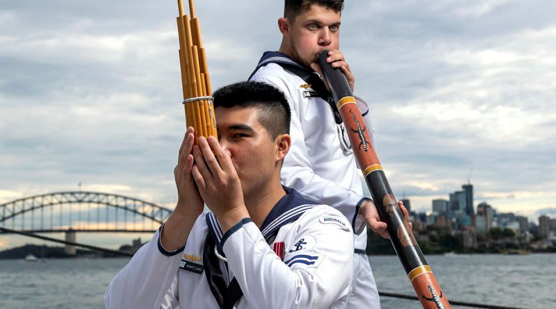 Navy sailor Leading Seaman Musician Henry Liang and Navy Indigenous Cultural Performer, Able Seaman Aviation Support Lynton Robbins, play traditional instruments during the recording of a music clip for the Japanese International Fleet Review 2022, at Garden Island, Fleet Base East. Story by Commander Fenn Kemp. Photo by Leading Seaman Jarryd Capper.