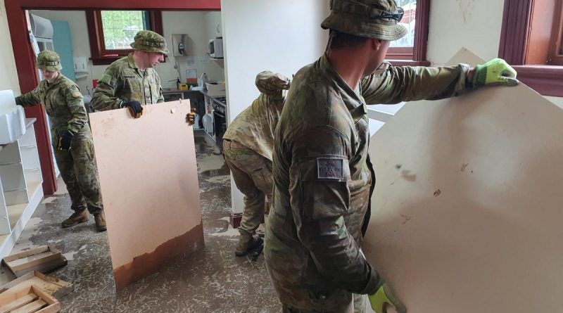 ADF members assist with the clean-up at St Joseph’s Primary School in Rochester during Operation Flood Assist 2022-2. Story by Captain Joanne Leca. Photo supplied.