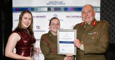 Major General Douglas Laidlaw, right, congratulates Mercury ISS’s Gabrielle Hendry, left, and Lieutenant Brooke Cooper at the NSW Employer Support Awards held in Sydney. Story by Flight Lieutenant Nick O’Connor. Photo by Corporal Kylie Gibson.
