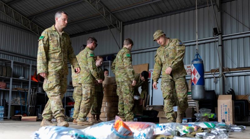 Army personnel from the 1st/19th Royal NSW Regiment prepare to move out to Moree from Dubbo, NSW, to support the NSW flood response. Story by Flight Lieutenant Rob Hodgson. Photo by Leading Aircraftman Samuel Miller.