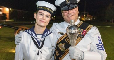 Seaman Elizabeth Dowler with her proud father, Petty Officer Musician Raymond Dowler, after graduating at the Royal Australian Navy Recruit School, HMAS Cerberus, Victoria. Photo by Leading Seaman James McDougall.