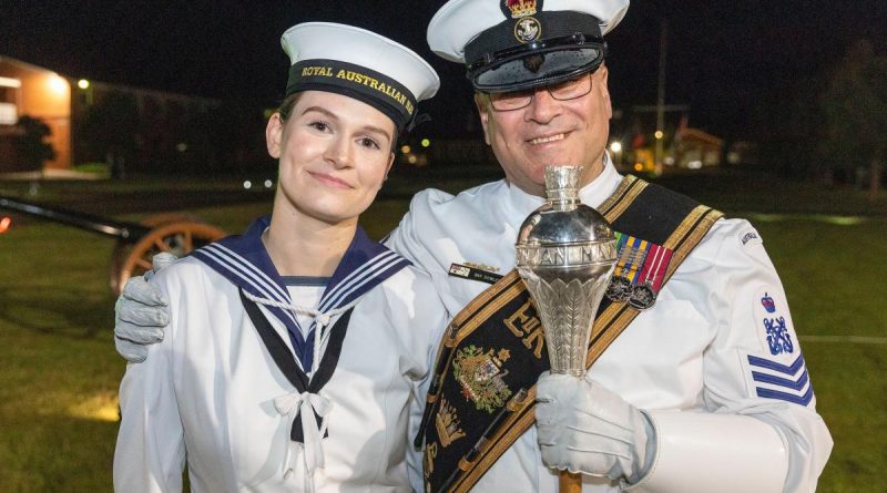 Seaman Elizabeth Dowler with her proud father, Petty Officer Musician Raymond Dowler, after graduating at the Royal Australian Navy Recruit School, HMAS Cerberus, Victoria. Photo by Leading Seaman James McDougall.
