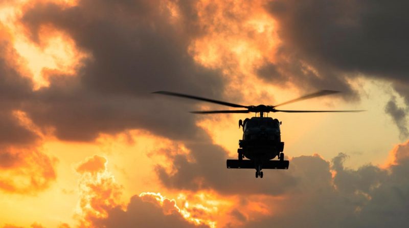 HMAS Hobart's embarked MH-60R helicopter Carnage returns to the ship during flying operations in the North Pacific Ocean as part of a regional presence deployment. Story by Lieutenant Brendan Trembath. Photo by Leading Seaman Daniel Goodman.