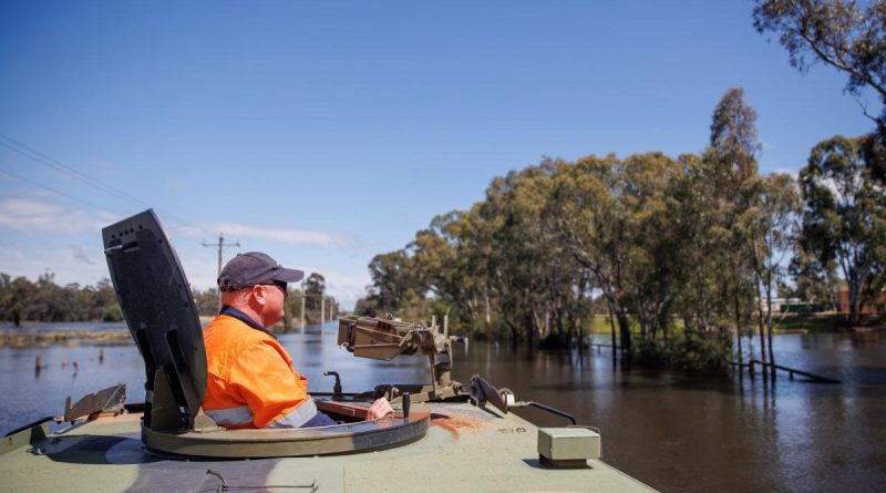 Local State Emergency Service and Country Fire Authority conduct route reconnaissance of flood affect areas in Echuca, in an Army Bushmaster protected mobility vehicle. Story by Captain Joanne Leca. Photo by Corporal Cameron Pegg.