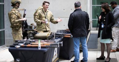 Captain Damien Freeman talks about captured enemy weapons during a display by the Australian Army History Unit at Russell Offices, Canberra. Story by Private Nicholas Marquis. Photo by Sergeant Matthew Bickerton.