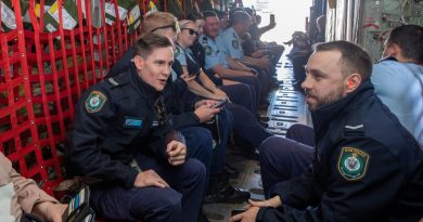 AFP and NSW Police officers aboard their flight on a C-130J Hercules aircraft as part of a Joint Military Police Unit community engagement day at RAAF Base Richmond. Story by Emily Egan. Photo by Leading Aircraftman Chris Tsakisiris.