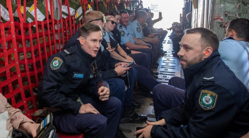 AFP and NSW Police officers aboard their flight on a C-130J Hercules aircraft as part of a Joint Military Police Unit community engagement day at RAAF Base Richmond. Story by Emily Egan. Photo by Leading Aircraftman Chris Tsakisiris.