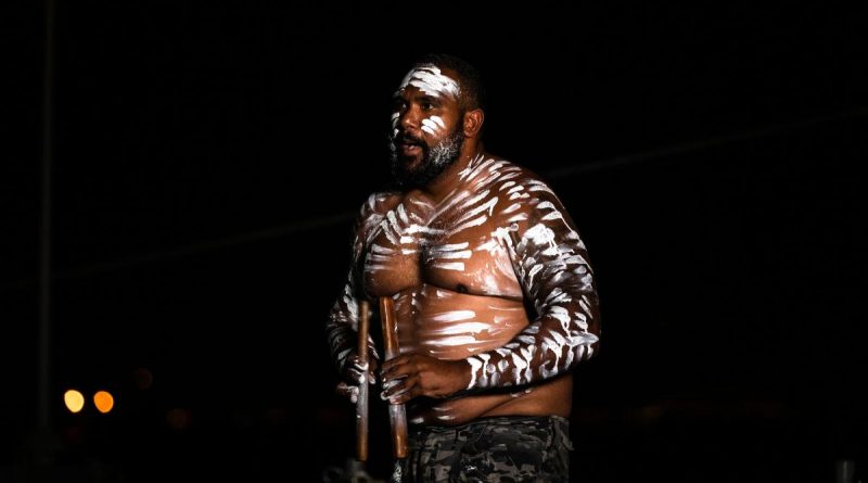 Able Seaman Boatswains Mate Jorde Lenoy conducts an Indigenous welcome ceremony during an official reception on board HMAS Hobart in Yokosuka, Japan. Story by Lieutenant Brendan Trembath. Photo by Leading Seaman Daniel Goodman.