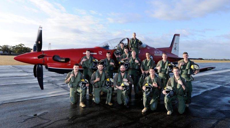 Graduates from the 267 ADF Pilots Course with a Pilatus PC-21 on the flight line at RAAF Base Pearce. Story by Peta Magorian. Photo by Chris Kershaw.
