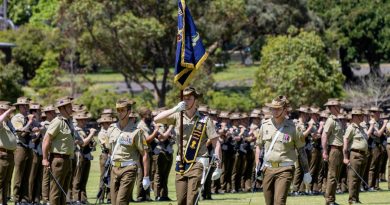 (L-R) Escort to the Queen’s Banner Australian Army Sergeant Daniel Stevens, Queen’s Banner Ensign Lieutenant Frederic Carter and Escort Sergeant Sean Bellert parade the Queen’s Banner at Victoria Barracks, Sydney. Story and photo by Corporal Jacob Joseph.