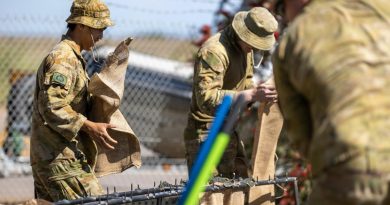 Soldiers from the 2nd Battalion, Royal Australian Regiment, conduct sandbagging at the Forbes NSW State Emergency Service depot. Photo by Corporal David Cotton.