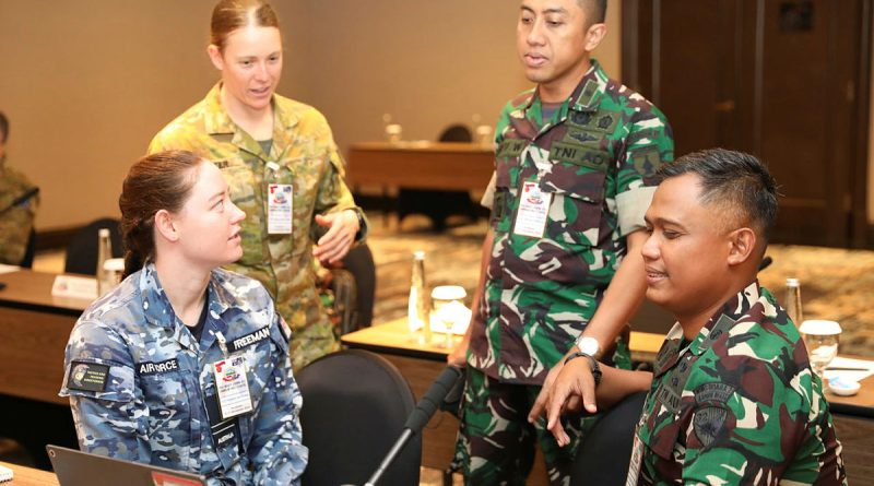 From left, Flight Lieutenant Stephanie Freeman, Captain Bianca Potter, Lieutenant Colonel Bayu Widaji and Major Rizka Budiman discuss joint logistics during Exercise Nusa Bhakti. Story and photo by Major Martin Hadley.