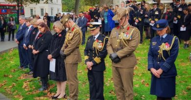 Pausing for two minutes silence during the Remembrance Day service at the Australian War Memorial at Hyde Park Corner, London. Story and photo by Lieutenant Commander John A Thompson.